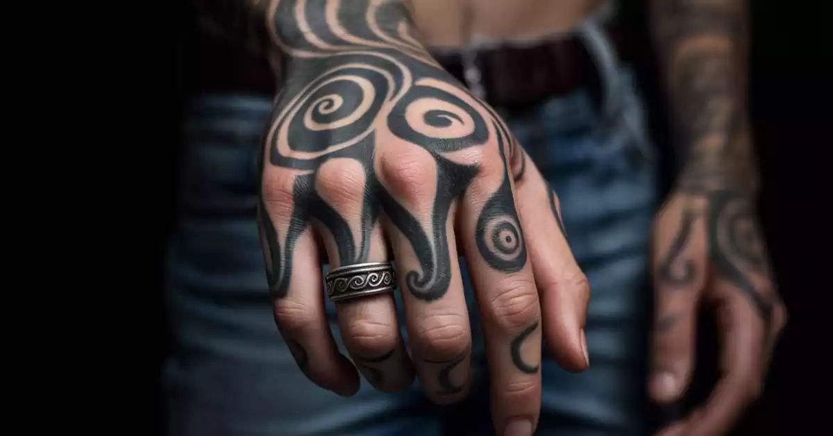 Female-hand-with-delicate-Maori-tattoo-patterns-extending-from-wrist-to-fingers